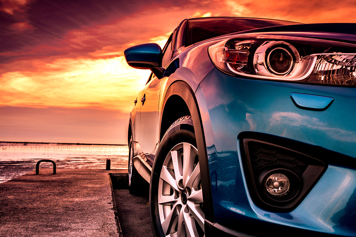 blue-compact-suv-car-with-sport-modern-design-parked-concrete-road